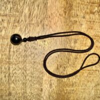 Pendentif Sphère en Obsidienne Œil Céleste Naturelle – Pierre de Protection & Ancrage. Boutique La Porte des Secrets