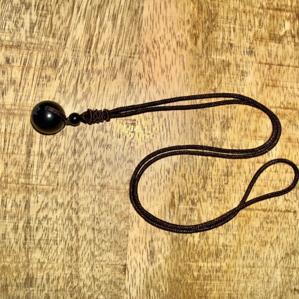 Pendentif Sphère en Obsidienne Œil Céleste Naturelle – Pierre de Protection & Ancrage. Boutique La Porte des Secrets