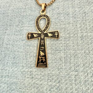Croix Ânkh ou Croix de Vie, pendentif émail noire et signes hiéroglyphes dorés avec chaîne. Boutique ésotérique La Porte des Secrets