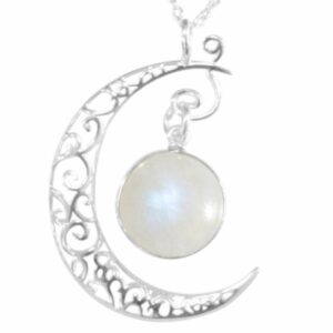 Pendentif croissant de lune en argent 925 et Pierre de Lune bleue sertie. Dimension de la pierre : environ 1.2 cm. Boutique de Minéraux La Porte des Secrets